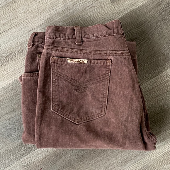 Vintage Levi movein on brown jeans with wear. See picture bottom hem. 36x34 - Picture 1 of 3